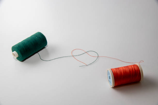 istock sewing thread rolls forming a heart shape out of the thread 1462779685