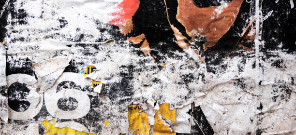 istock Old grunge torn collage posters creased crumpled paper placard texture background. Ripped faded paper backdrop surface placard 1462780984