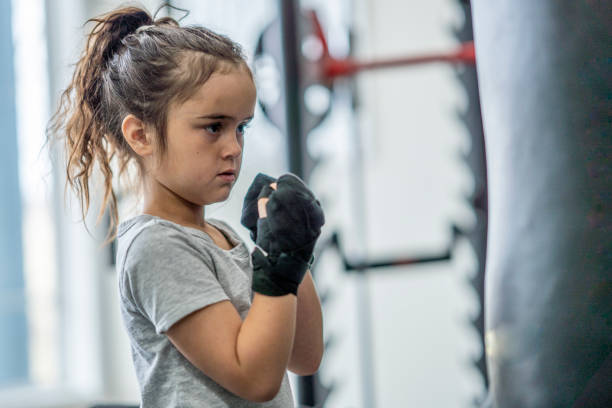 istock Young Girl Boxing 1462788804