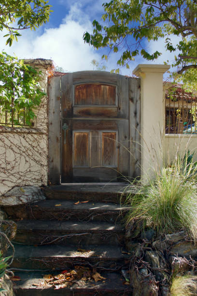 istock Neglected wood gate and steps at the entrance 1462793703
