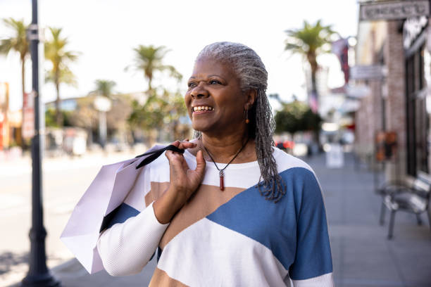 istock A mature black woman shopping downtown 1462793814