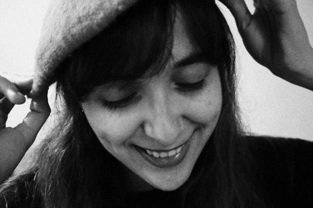 istock Girl Smiling. Monochromatic Black and White Tones 1462813389