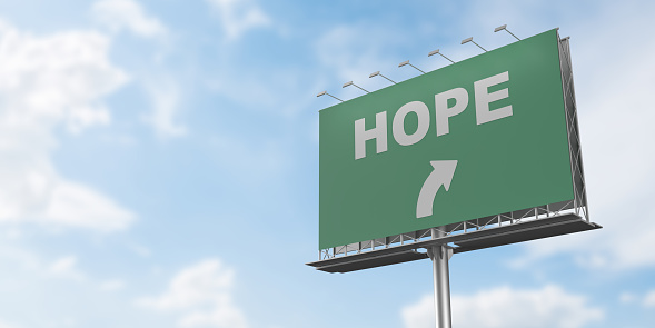 Hope and positive emotions concept. 3D rendered highway billboard with hope text. Large copy space on sky background. The background can be changed with the clipping path feature.
