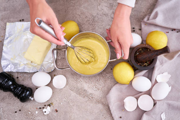 istock making traditional hollandaise sauce in a pot at domestic kitchen 1462826121