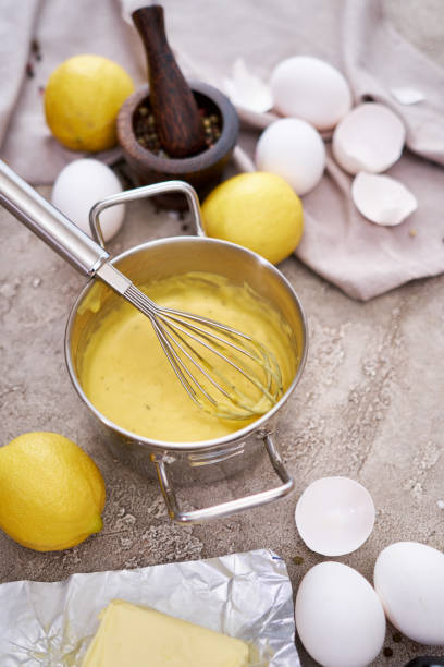istock making traditional hollandaise sauce in a pot at domestic kitchen 1462826140