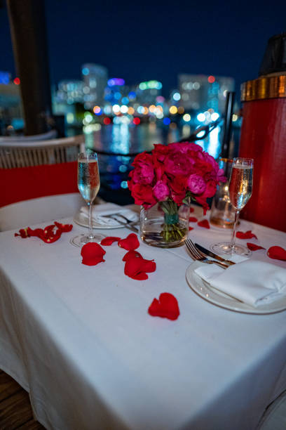 Valentines Day romatic table on water stock photo
