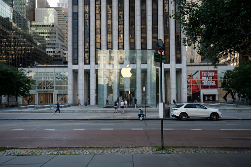 New York, NY, USA - July 9, 2022: Front view of the Apple Fifth Avenue Store in the luxury shopping district of Midtown Manhattan, New York City, in the early morning.