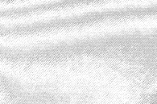White velveteen upholstery fabric texture background.