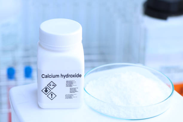 Calcium hydroxide in bottle , chemical in the laboratory and industry Calcium hydroxide in bottle , chemical in the laboratory and industry, Chemicals used in the analysis hydroxide stock pictures, royalty-free photos & images