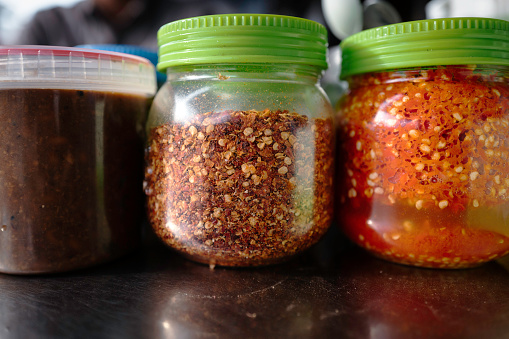 Do you like spicy food ? When I ate breakfast in Cambodia, I saw several kinds of chili on the table. Everything looks so spicy. Simply crushed chili, sambal and one more.
