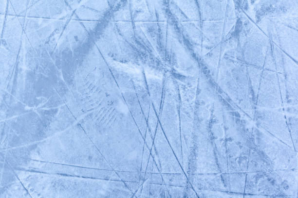 istock Empty ice rink with skate marks after the session outdoor. 1462853876