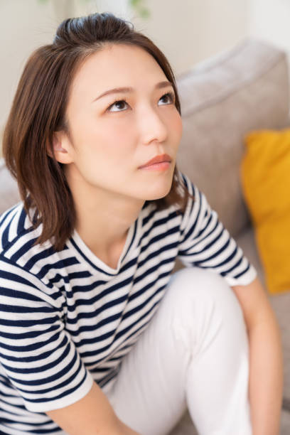 istock attractive asian woman , think 1462867000