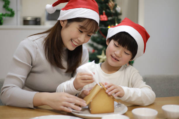 istock Parent and child building a Hexenhaus 1462874571