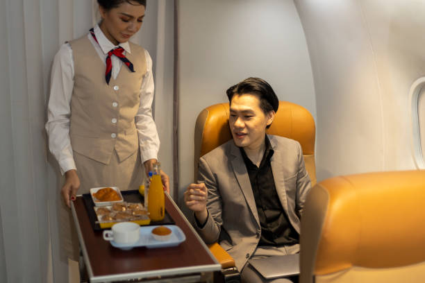 istock Passengers in an airplane cabin 1462875353