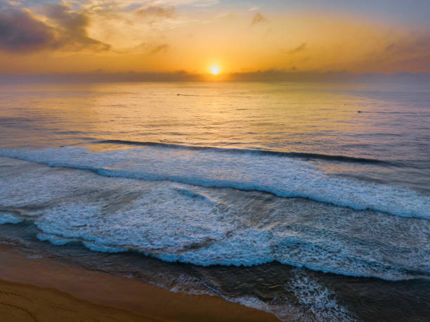 istock Summer sunrise at the seaside with clouds and haze 1462882415