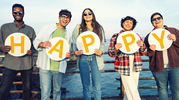 istock Young people holding discs with the word 
