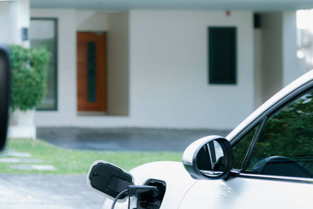 istock EV car plugged-in with cable from progressive home charging station. 1462913246