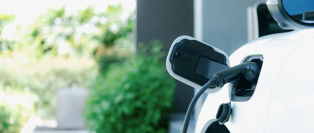 istock EV car plugged-in with cable from progressive home charging station. 1462914473