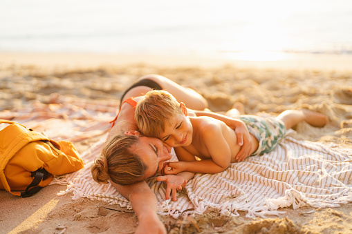 istock Mother and son at the beach 1462924373