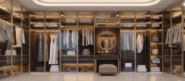 istock Panorama of luxury walk in closet interior with wood and gold elements.3d rendering 1462929651