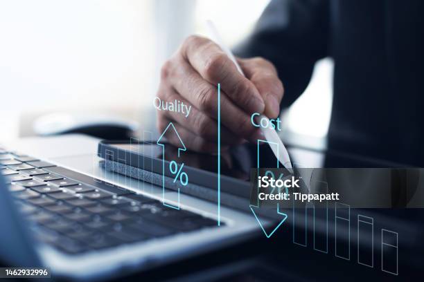 Cost And Quality Control Business Strategy And Project Management Concept Businessman Working On Digital Tablet With Quality Control Growth Graph And Cost Reduction Effective Business Stock Photo - Download Image Now