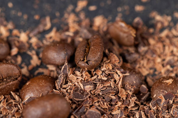 istock Roasted coffee beans lie together with chocolate crumbled into small pieces 1462938988