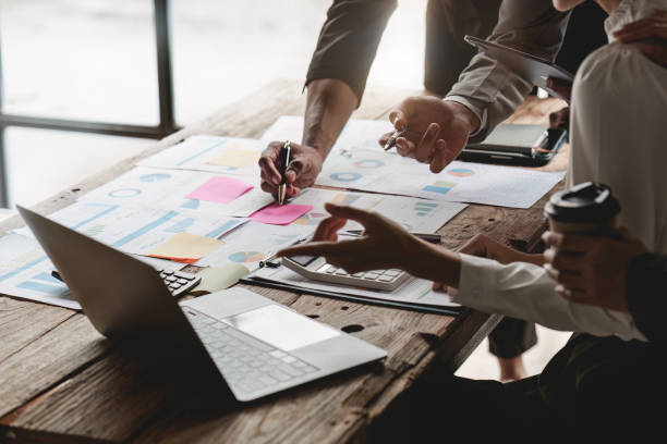 istock Group of ux developer and ui designer brainstorming about app interface design at modern office. Creative digital development agency 1462939219