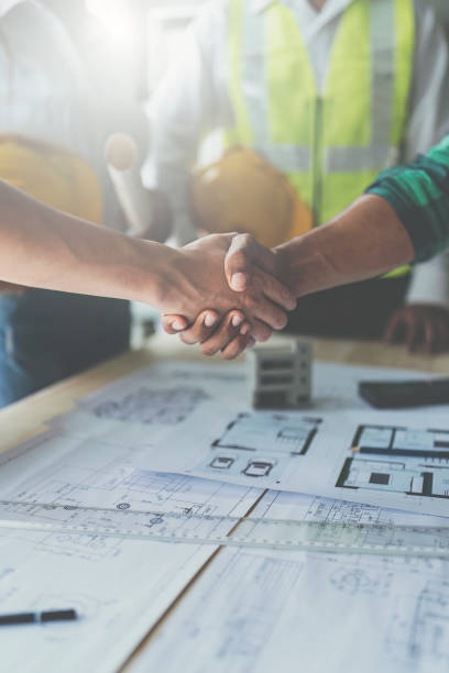 Architect people working with blueprints. Civil engineer teams meeting working together. Foreman industry project manager engineer teamwork
