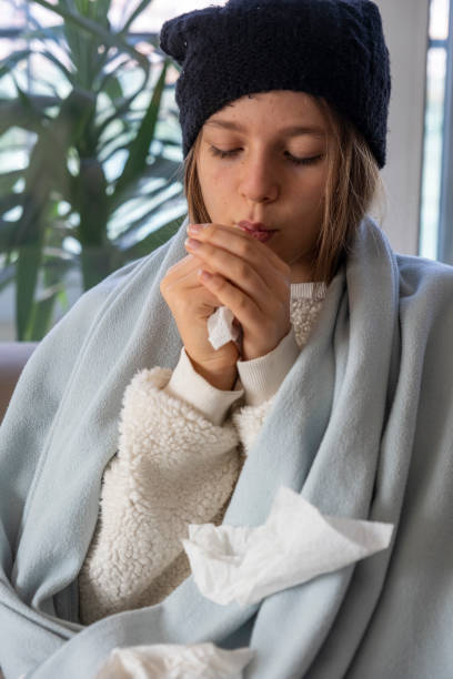 istock Beautiful young girl with a cold 1462942515