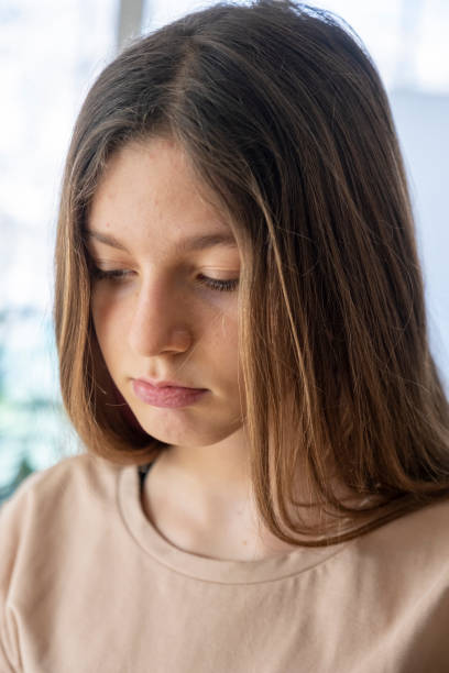 istock Young beautiful girl looks thoughtful 1462942520