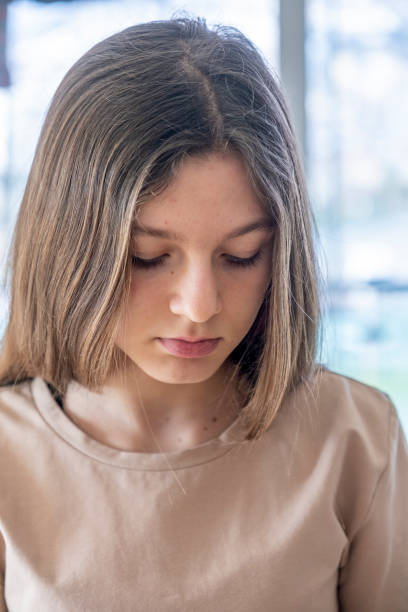 istock Young beautiful girl looks thoughtful 1462942536