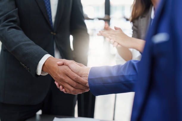 Business shaking hands. Successful businessmen handshaking after good deal. Finishing up meeting concept Business shaking hands. Successful businessmen handshaking after good deal. Finishing up meeting concept. office buddies stock pictures, royalty-free photos & images