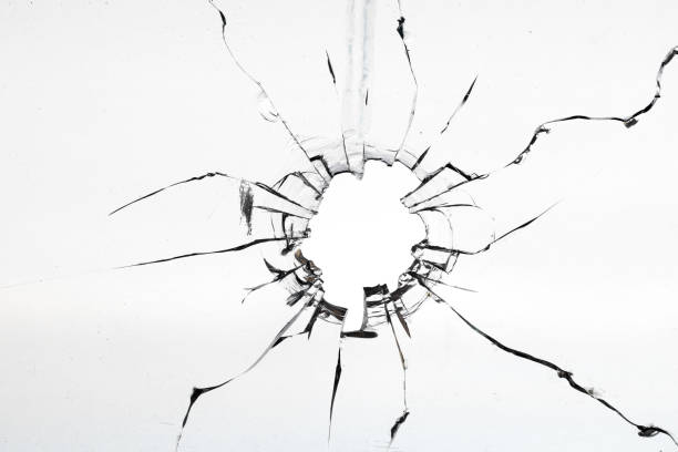 istock Cracks in the glass on a white background. Abstract background. 1462948104