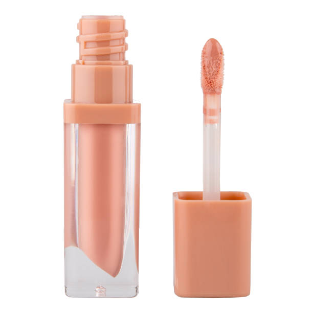 istock Lip gloss in a transparent package with a brush on an isolated white background 1462955101