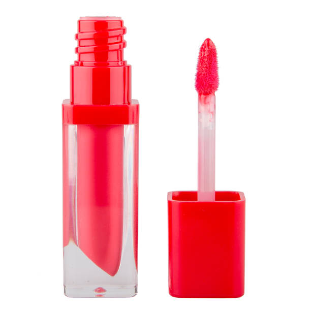 istock Lip gloss in a transparent package with a brush on an isolated white background 1462955264