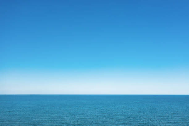 istock Horizon line, blue sky and blue sea. Drone view. 1462956664