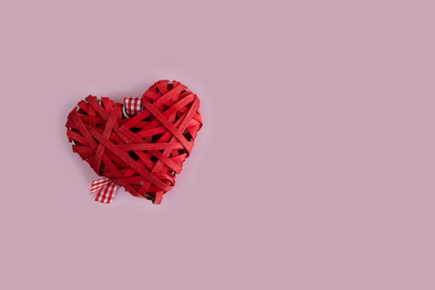 istock Valentine's Day background, red heart on pink, valentine's day postcard 1462957585