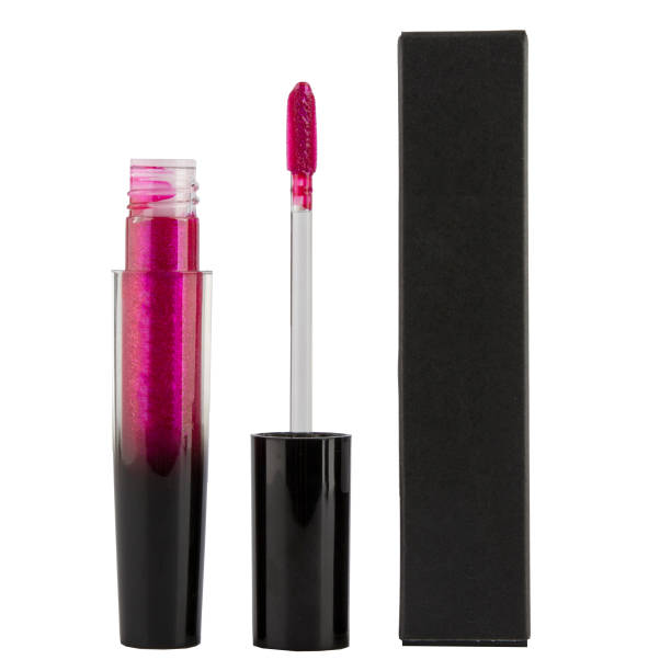 istock Lip gloss in a transparent package with a brush on an isolated white background 1462962002