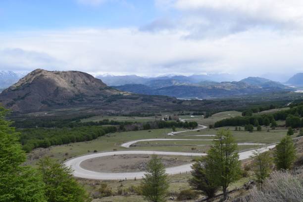 Carretera Austral route in Chile on a sunny day, cloudy sky background The Carretera Austral route in Chile on a sunny day, cloudy sky background carretera austral chile stock pictures, royalty-free photos & images