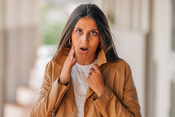istock latin girl in the street with a surprised expression 1462965290