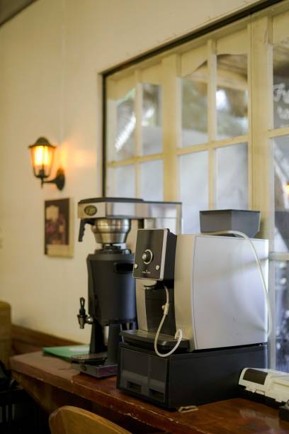 Vertical shot of a coffee machine in a room