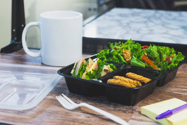 istock Lunch salad on desktop, office ambient healthy food 1462971228