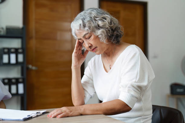 istock Senior woman feeling blue worried about health problems 1462974024