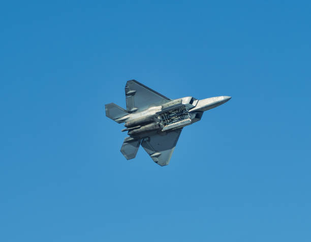 istock Military jet in the blue sky during the daytime 1462975082