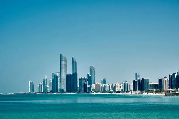 Photo of Beautiful skyline view of Abu Dhabi city with skyscrapers and high-rise buildings during the daytime