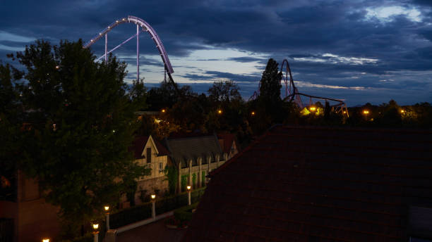 roller coaster silverstar from europa-park in germany at night - rust imagens e fotografias de stock