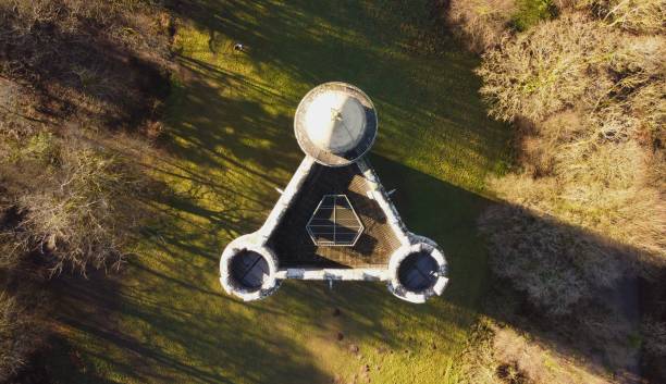 istock Closeup of a building in a green forest 1462979652