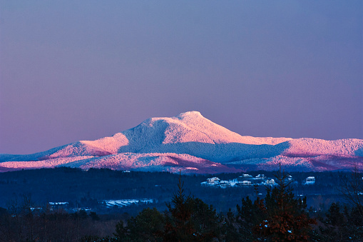 A beautiful view of snow-covered Camel's Hump from Burlington, Vermont