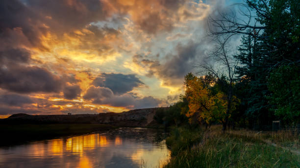 istock Mesmerizing sunset view over a river at Writing-On-Stone Provincial Park in Alberta, Canada 1462980675
