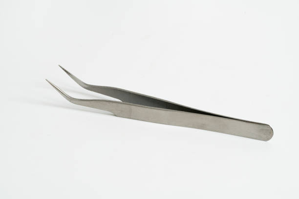 istock Tweezers on a white background 1462982332